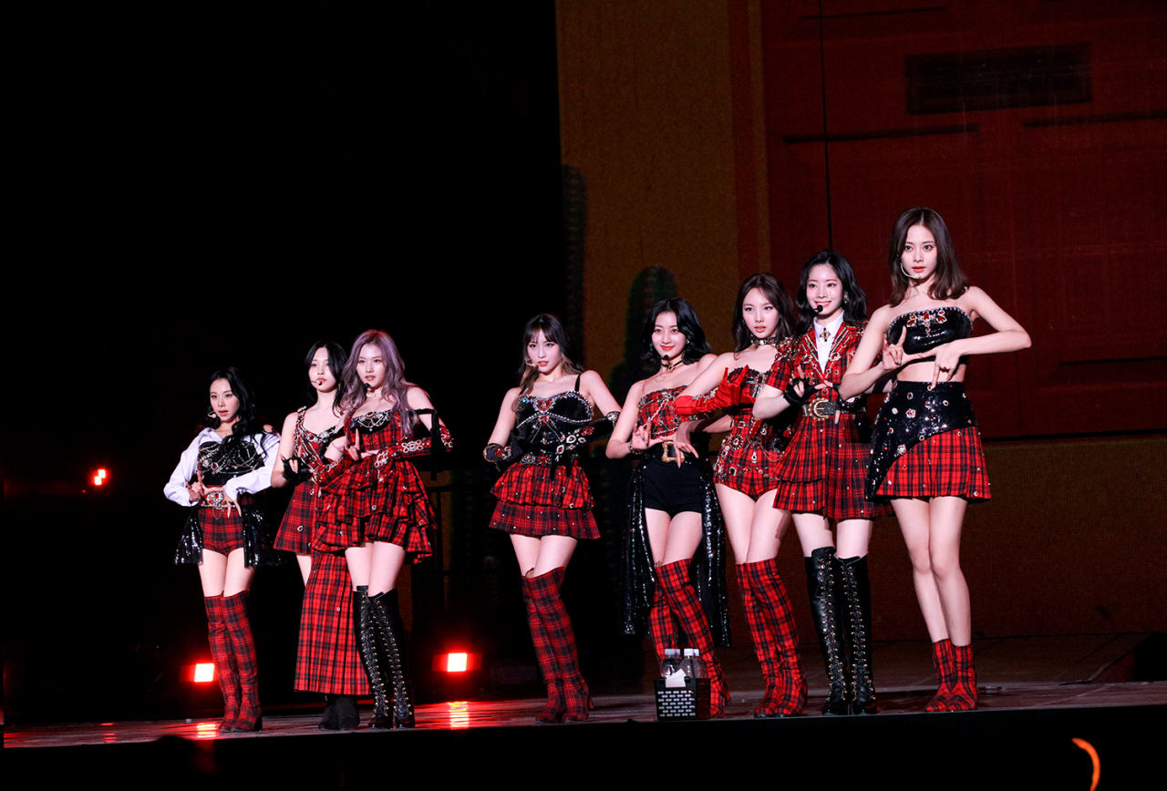 Girl group Twice performs during “Twice 4th World Tour ‘Ⅲ’” on Sunday. (JYP Entertainment)